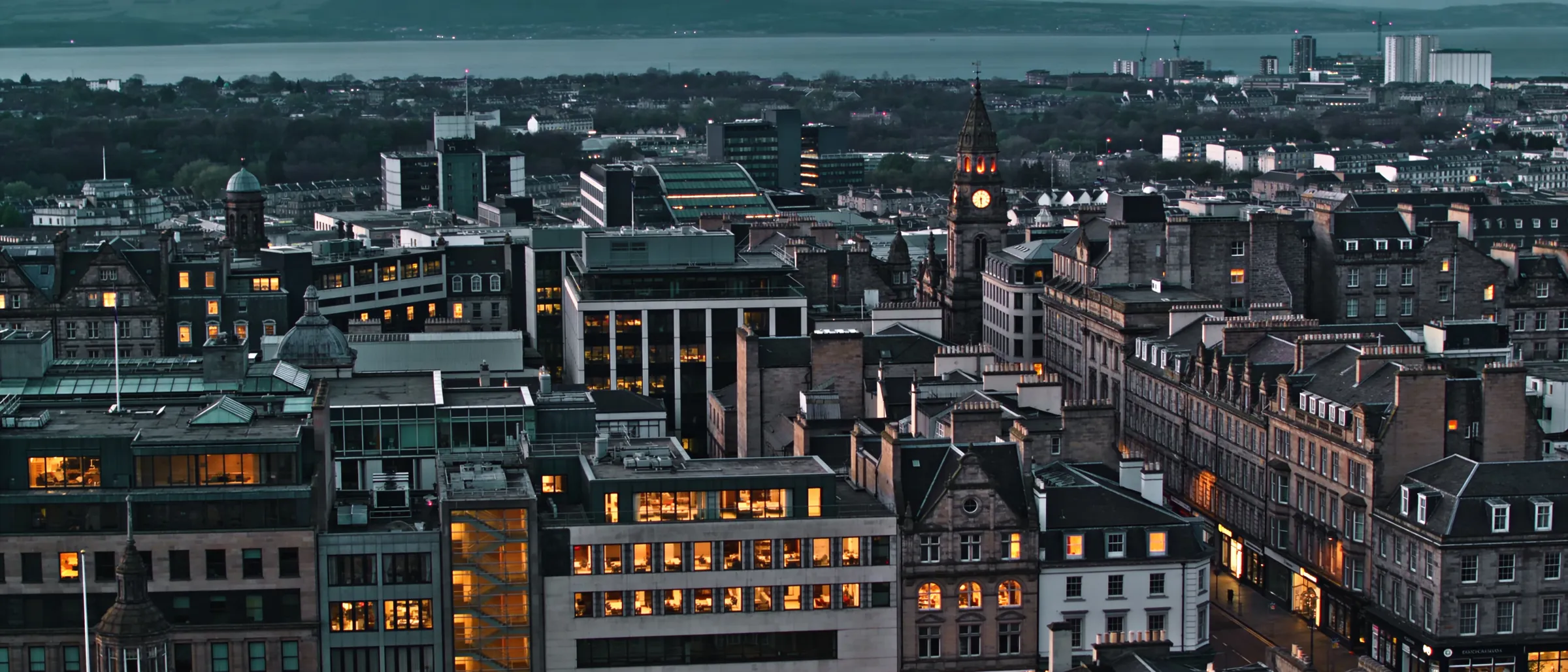 A slow drift across a Scottish commercial building at dusk