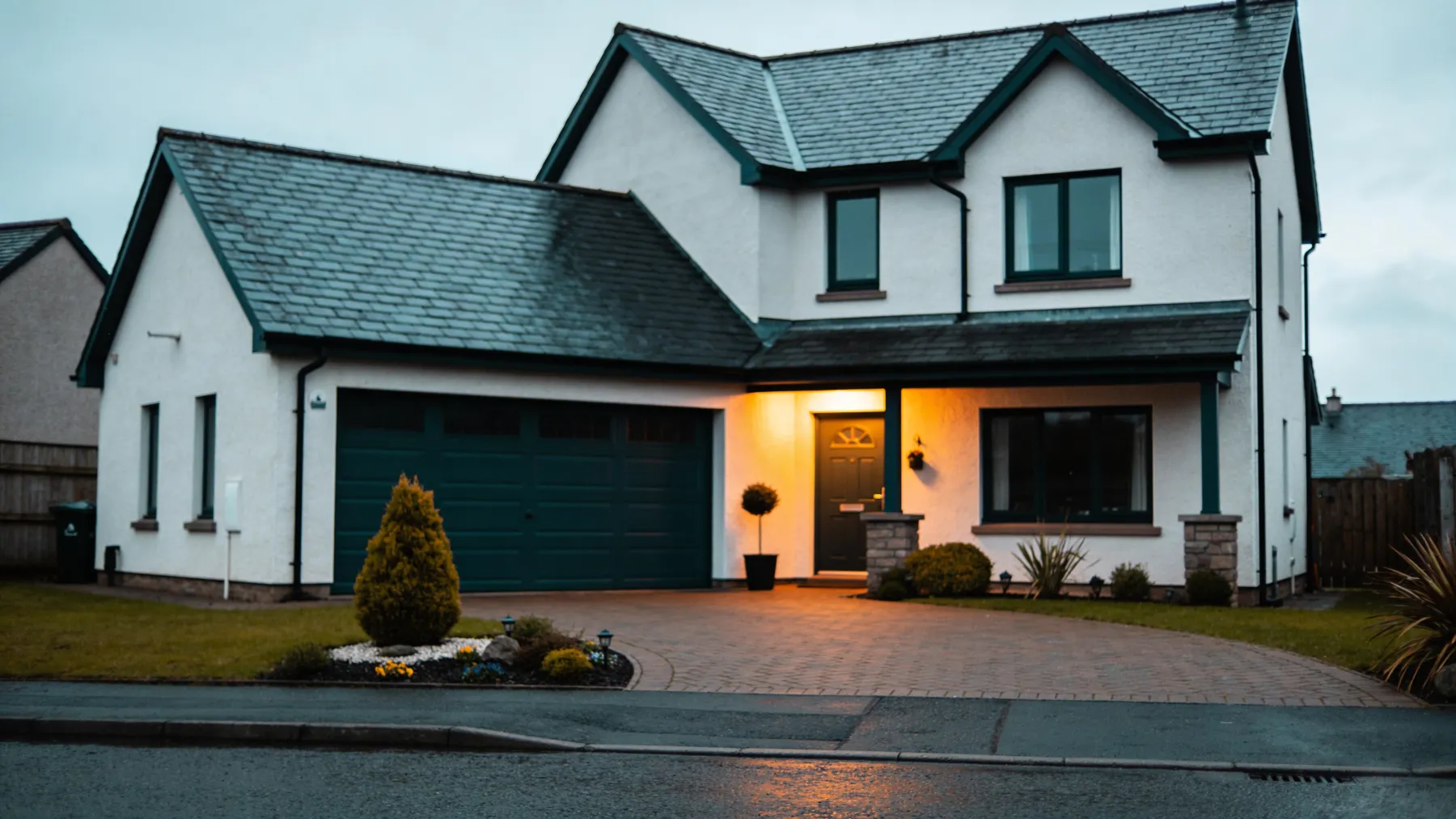 An attractive Scottish family home with clean render and tidy driveway