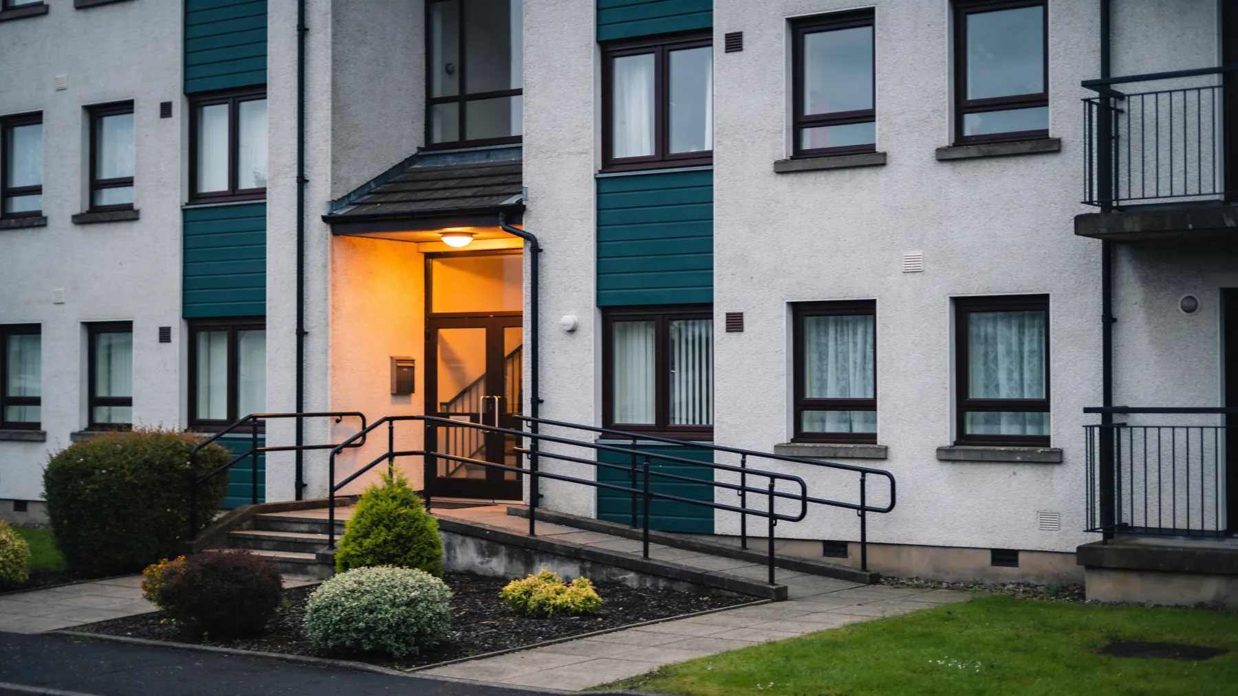 Tidy communal grounds of a Scottish housing association block