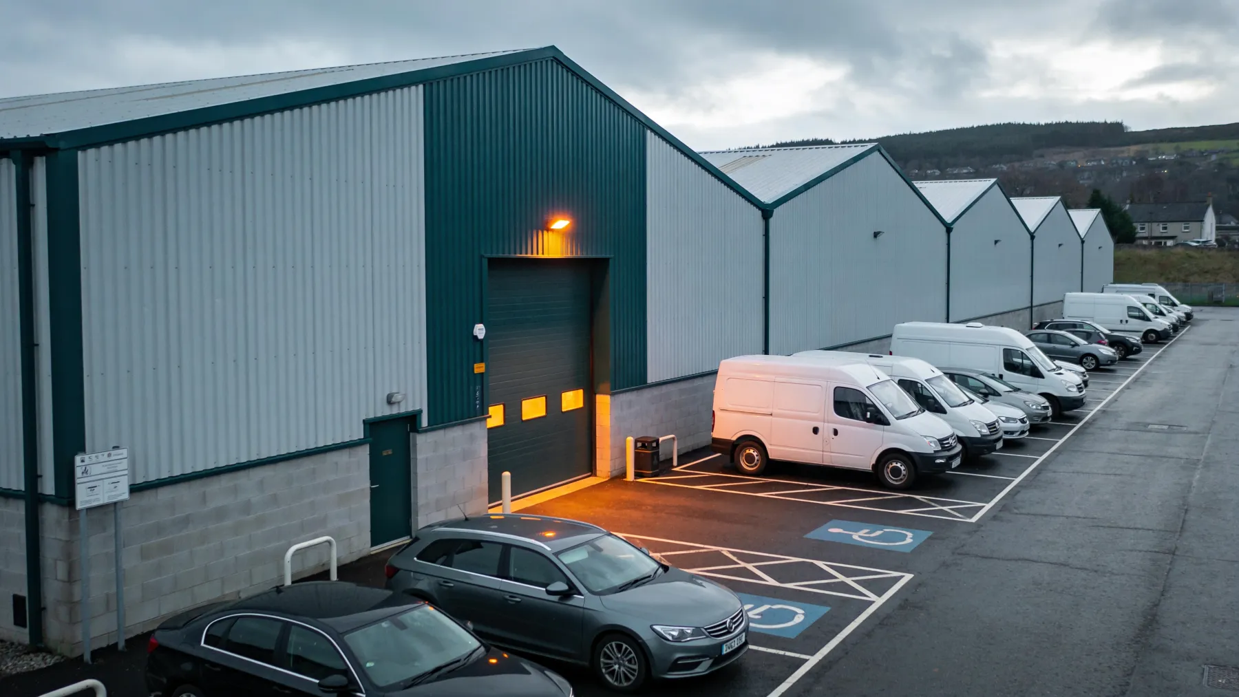 A clean industrial and logistics unit with an orderly yard